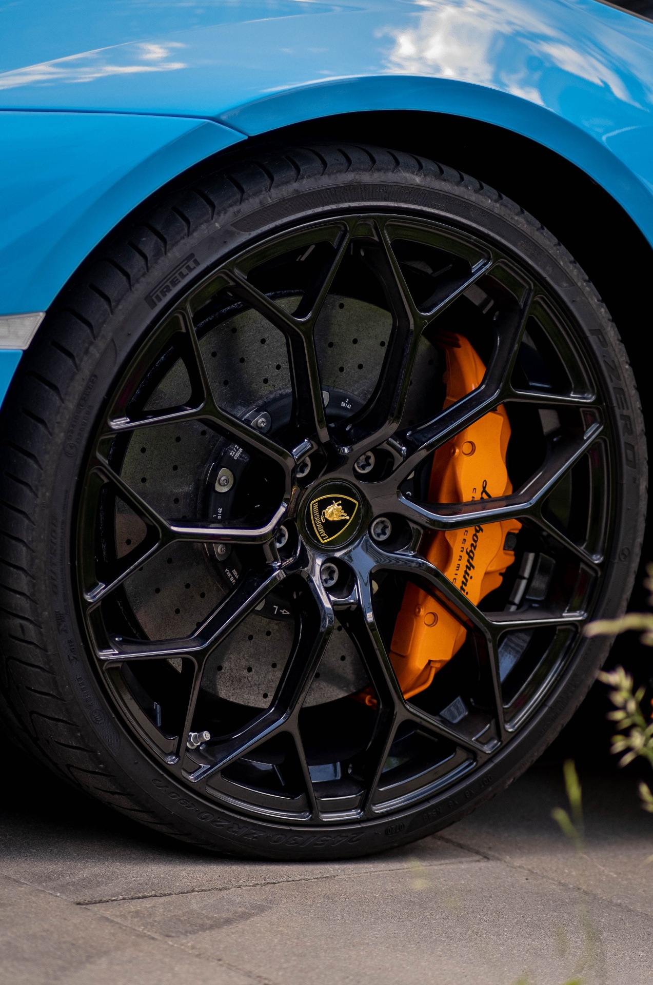 Lamborghini wheel with orange calipers